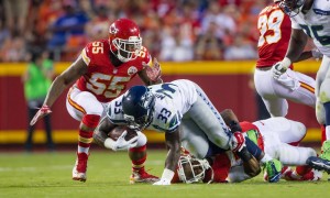 August 21st, 2015: Seattle Seahawks running back Christine Michael (33) dives for yardage during the NFL preseason game between the Seattle Seahawks and the Kansas City Chiefs at Arrowhead Stadium in Kansas City, Missouri. Photographer: William Purnell/Icon Sportswire