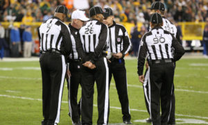 October 20 2016: The officials huddle during a time out of the Green Bay Packers vs Chicago Bears game at Lambeau Field in Green Bay, WI. (Photo by Larry Radloff/Icon Sportswire)