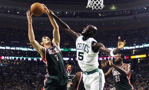 garnett defends ilyasova