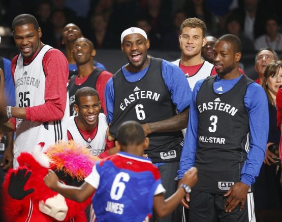 NBA All-Stars Durant, Paul, James, Griffin and Wade watch a fan dance contest during practice for the NBA All-Star basketball game in Houston