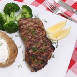 1078905-a-steak-dinner-with-baked-potato-and-veggies