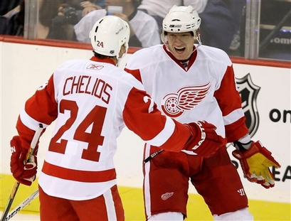 capt.13bf80e5e2c64094b598201e79663d8f.red_wings__penguins_hockey_pagp108