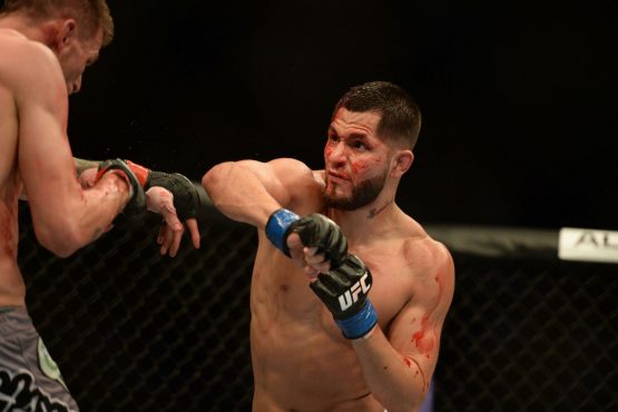 Jorge Masvidal throwing an elbow - Kyle Terada-USA      TODAY Sports