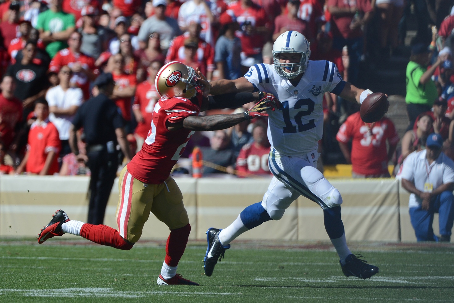 Luck Stiff arm 49ers Kyle Terada-USA TODAY
      Sports