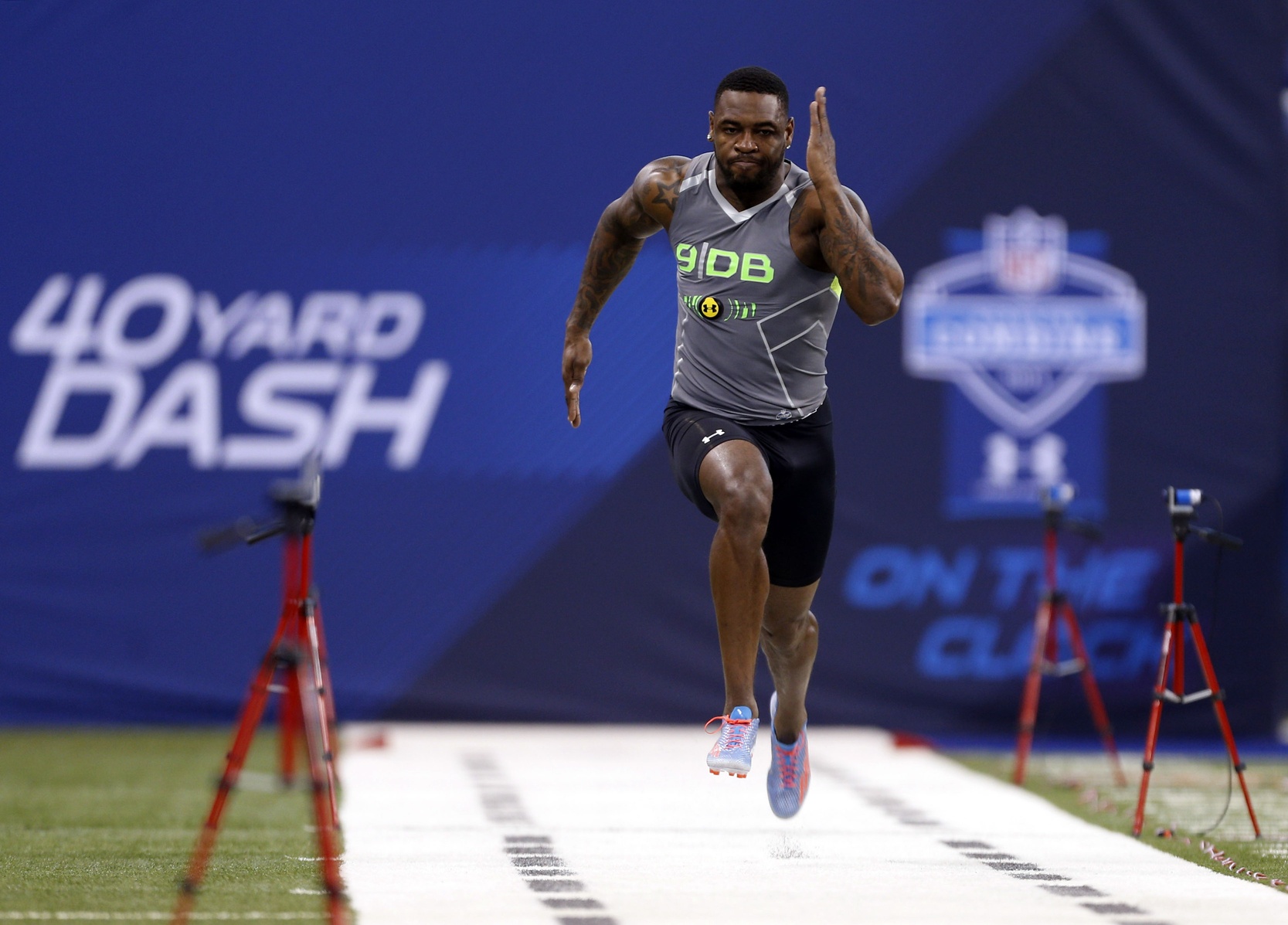 Feb 25, 2014; Indianapolis, IN, USA; Florida State Seminoles defensive back Terrence Brooks runs the 40 yard dash during the 2014 NFL Combine at Lucas Oil Stadium. Mandatory Credit: Brian Spurlock-USA TODAY Sports