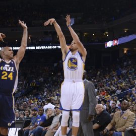 stephen curry shoots a three over richard jefferson