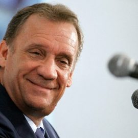 Minnesota Timberwolves team president of basketball operations and new head coach Flip Saunders smiles during a media availability in Minneapolis, Friday, June 6, 2014. (AP Photo/Ann Heisenfelt)