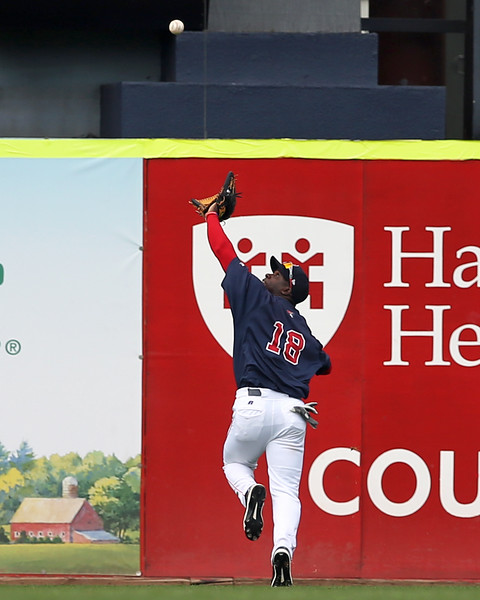 Rusney Castillo chases a ball while with the Portland
      Sea Dogs (Photo by Kelly O'Connor via
      SittingStill.smugmug.com)