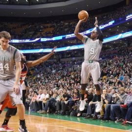 BOSTON, MA - DECEMBER 7: Rajon Rondo #9 of the Boston Celtics shoots against the Washington Wizards?uring the game on December 7, 2014 at TD Garden in Boston, Massachusetts. NOTE TO USER: User expressly acknowledges and agrees that, by downloading and or using this Photograph, user is consenting to the terms and conditions of the Getty Images License Agreement. Mandatory Copyright Notice: Copyright 2014 NBAE (Photo by Brian Babineau/NBAE via Getty Images)