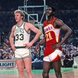 BOSTON - 1983: Dominique Wilkins #21 of the Atlanta Hawks and Larry Bird #33 of the Boston Celtics stand on the court during a game played in 1983 at the Boston Garden in Boston, Massachusetts. NOTE TO USER: User expressly acknowledges and agrees that, by downloading and or using this photograph, User is consenting to the terms and conditions of the Getty Images License Agreement. Mandatory Copyright Notice: Copyright 1983 NBAE (Photo by Dick Raphael/NBAE via Getty Images)