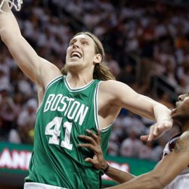 Boston Celtics' Kelly Olynyk (41) goes in for a dunk against Cleveland Cavaliers' James Jones in a first round NBA playoff basketball game Sunday, April 19, 2015, in Cleveland. (AP Photo/Mark Duncan)