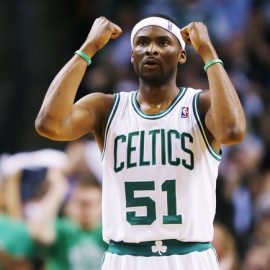 Boston Celtics' Dooling celebrates a teammate's basket against the Miami Heat during Game 3 of their Eastern Conference Finals NBA basketball playoffs in Boston