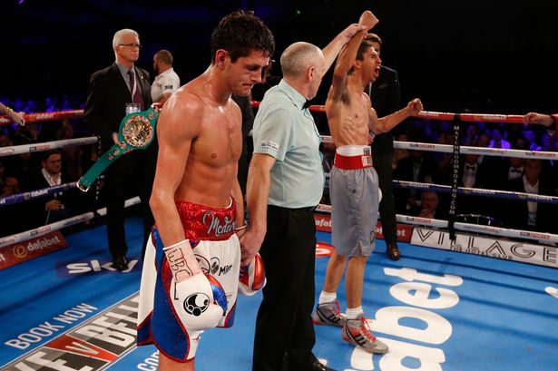 rey-vargas-celebrates-victory-after-the-fight-as-gavin-mcdonnell-looks-on-dejected