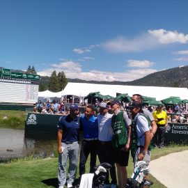 Group shot of players and caddies