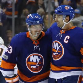 NEW YORK, NY - OCTOBER 07: (l-r) Casey Cizikas #53 and John Tavares #91 of the New York Islanders celebrate Cizikas's empty net goal against the Buffalo Sabres at the Barclays Center on October 7, 2017 in the Brooklyn borough of New York City. The Islanders defeated the Sabres 6-3. (Photo by Bruce Bennett/Getty Images)