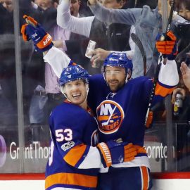 NEW YORK, NY - NOVEMBER 16: Johnny Boychuk #55 of the New York Islanders (r) celebrates his goal at 15:35 of the third period against the Carolina Hurricanes and is joined by Casey Cizikas #53 (l) at the Barclays Center on November 16, 2017 in the Brooklyn borough of New York City. (Photo by Bruce Bennett/Getty Images)