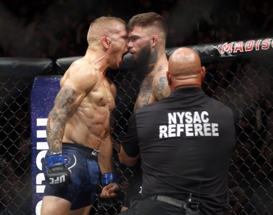 tj dillashaw yells in cody garbrandt's face