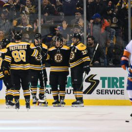 Dec 9, 2017; Boston, MA, USA; Boston Bruins left wing Brad Marchand (63) celebrates with teammates after scoring a goal against the New York Islanders during the second period at TD Garden. Mandatory Credit: Bob DeChiara-USA TODAY Sports