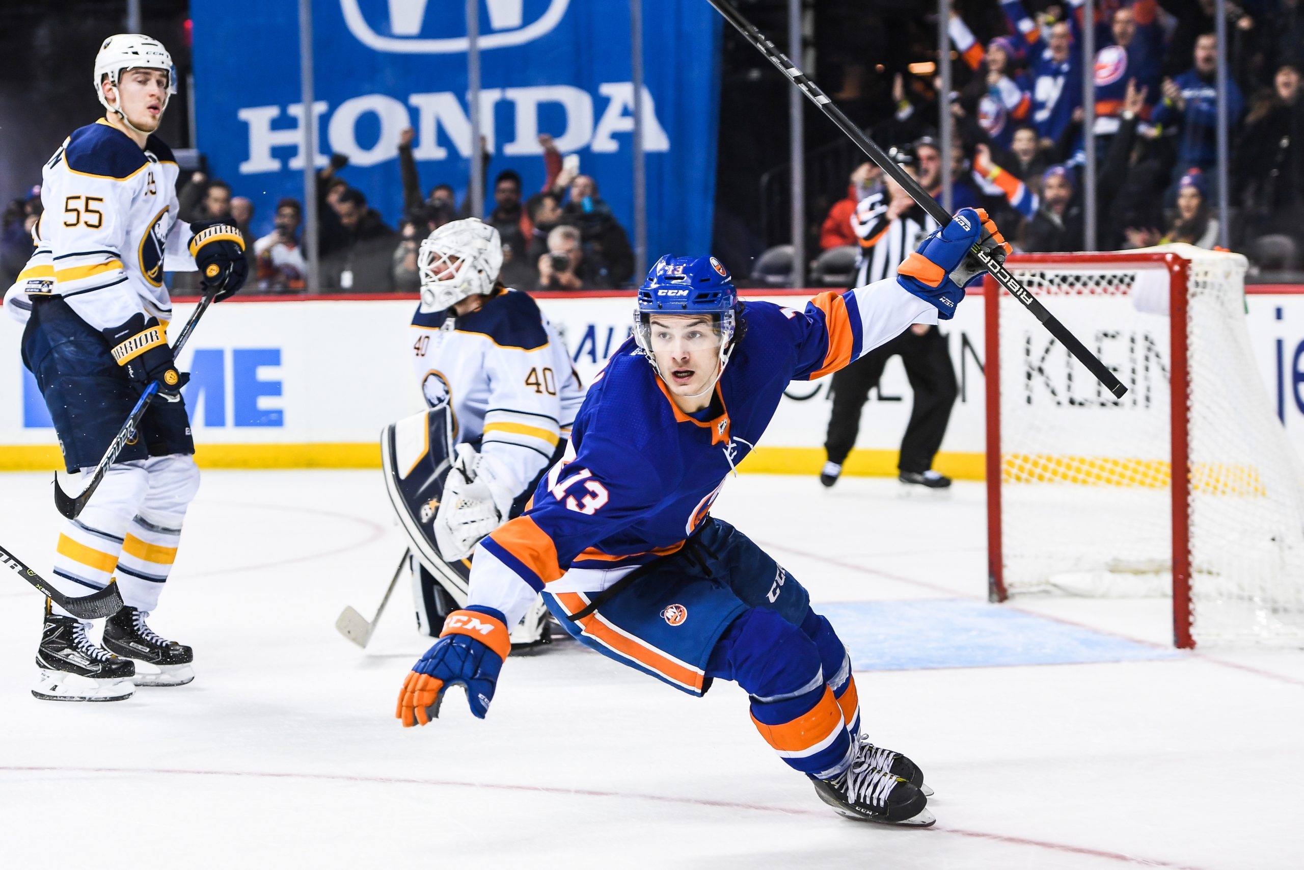 Dec 27, 2017; Brooklyn, NY, USA; New York Islanders center Mathew Barzal (13) celebrates his goal in overtime to win the game 3-2 during the overtime period go the game between the New York Islanders and the Buffalo Sabres at Barclays Center. Mandatory Credit: Dennis Schneidler-USA TODAY Sports