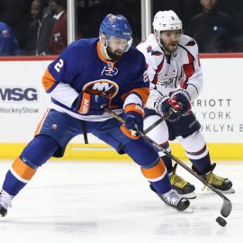 Dec 27, 2016; Brooklyn, NY, USA; New York Islanders defenseman Nick Leddy (2) controls the puck as Washington Capitals left wing Alex Ovechkin (8) gets a stick up during the first period at Barclays Center. Mandatory Credit: Anthony Gruppuso-USA TODAY Sports