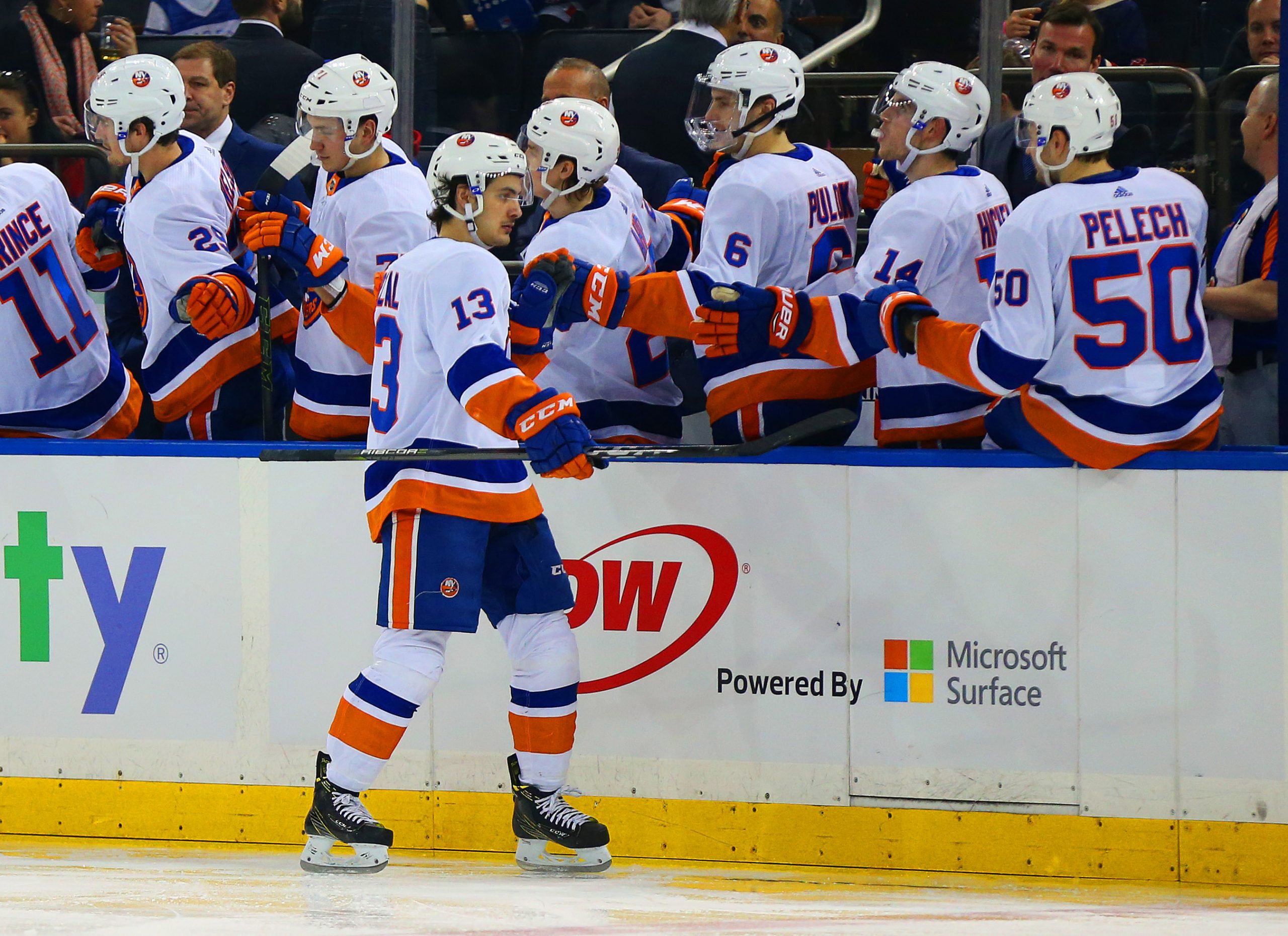 Jan 13, 2018; New York, NY, USA; New York Islanders center Mathew Barzal (13) is congratulated after scoring a goal against the New York Rangers during the second period at Madison Square Garden. Mandatory Credit: Andy Marlin-USA TODAY Sports