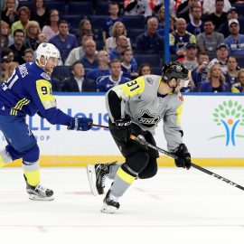 Jan 28, 2018; Tampa, FL, USA; Atlantic Division forward Steven Stamkos (91) of the Tampa Bay Lightning reaches for the puck on Metropolitan Division forward John Tavares (91) of the New York Islanders during the 2018 NHL All Star Game at Amalie Arena. Mandatory Credit: Kim Klement-USA TODAY Sports