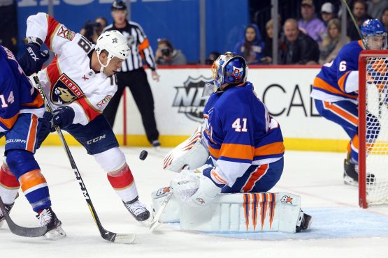 Jan 30, 2018; Brooklyn, NY, USA; New York Islanders goalie Jaroslav Halak (41) allows a goal to Florida Panthers defenseman Michael Matheson (not pictured) in front of Panthers center Micheal Haley (18) during the first period at Barclays Center. Mandatory Credit: Brad Penner-USA TODAY Sports