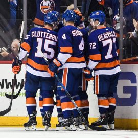 Feb 15, 2018; Brooklyn, NY, USA; New York Islanders celebrate the goal of New York Islanders defenseman Thomas Hickey (14) against the New York Rangers to make it 3-0 during the third period at Barclays Center. Mandatory Credit: Dennis Schneidler-USA TODAY Sports
