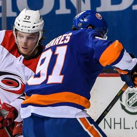 Mar 18, 2018; Brooklyn, NY, USA;New York Islanders goaltender Jaroslav Halak (41) makes a save on Carolina Hurricanes left wing Brock McGinn (23) during the first period at Barclays Center. Mandatory Credit: Dennis Schneidler-USA TODAY Sports