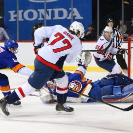 Mar 15, 2018; Brooklyn, NY, USA; Washington Capitals right wing T.J. Oshie (77) scores a goal a against the New York Islanders during the first period at Barclays Center. Mandatory Credit: Andy Marlin-USA TODAY Sports