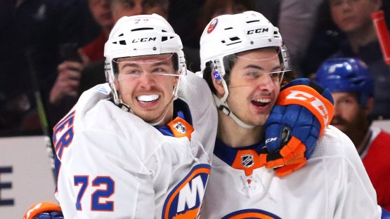 Jan 15, 2018; Montreal, Quebec, CAN; New York Islanders center Anthony Beauvillier (72) celebrates with center Mathew Barzal (13) after scoring a goal against the Montreal Canadiens during the first period at Bell Centre. Mandatory Credit: Jean-Yves Ahern-USA TODAY Sports