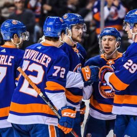 Mar 22, 2018; Brooklyn, NY, USA; New York Islanders left wing Anders Lee (27) celebrates with teammates after scoring a goal against the Tampa Bay Lightning during the second period at Barclays Center. Mandatory Credit: Dennis Schneidler-USA TODAY Sports