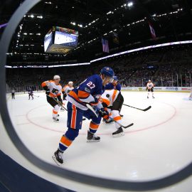 Sep 17, 2017; Uniondale, NY, USA; New York Islanders center Anders Lee (27) and Philadelphia Flyers defenseman Ivan Provorov (9) fight for the puck during the first period of a preseason game at NYCB Live at the Nassau Veterans Memorial Coliseum. Mandatory Credit: Brad Penner-USA TODAY Sports