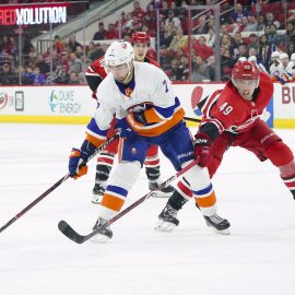 Feb 16, 2018; Raleigh, NC, USA; New York Islanders forward Jordan Eberle (7) skates with the puck against Carolina Hurricanes forward Victor Rask (49) at PNC Arena. The New York Islanders defeated the Carolina Hurricanes 3-0. Mandatory Credit: James Guillory-USA TODAY Sports