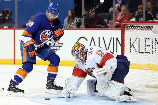 Mar 26, 2018; Brooklyn, NY, USA; Florida Panthers goalie James Reimer (34) makes a save against New York Islanders left wing Josh Bailey (12) during the second period at Barclays Center. Mandatory Credit: Brad Penner-USA TODAY Sports