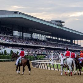 Jun 9, 2018; Elmont, NY, USA; Mike Smith aboard Justify (1) is being interviewed on the gallup back to the winners circle after winning the 150th Belmont Stakes and completes the Triple Crown at Belmont Park. Mandatory Credit: Douglas DeFelice-USA TODAY Sports