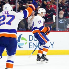 Oct 4, 2018; Raleigh, NC, USA; New York Islanders right wing Josh Bailey (12) celebrates his game winning overtime goal against the Carolina Hurricanes at PNC Arena. The New York Islanders defeated the Carolina Hurricanes 2-1 in the overtime. Mandatory Credit: James Guillory-USA TODAY Sports