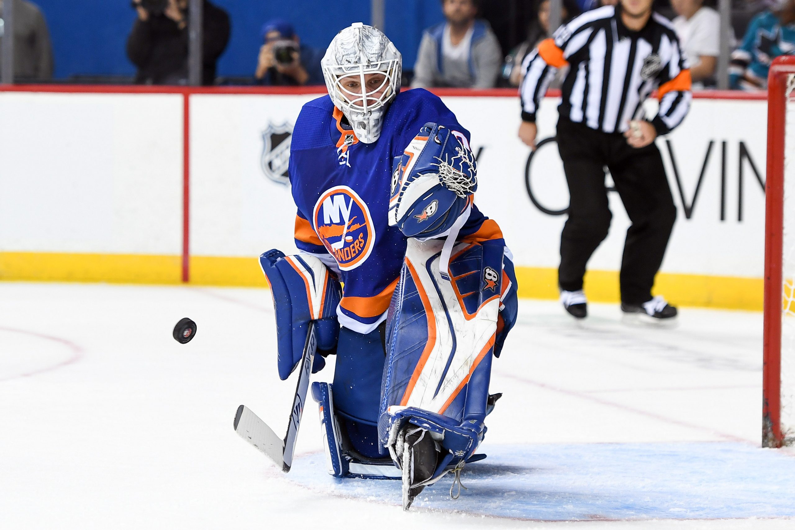 Oct 8, 2018; Brooklyn, NY, USA; New York Islanders goaltender Robin Lehner (40) makes a save against the San Jose Sharks during the first period at Barclays Center. Mandatory Credit: Dennis Schneidler-USA TODAY Sports