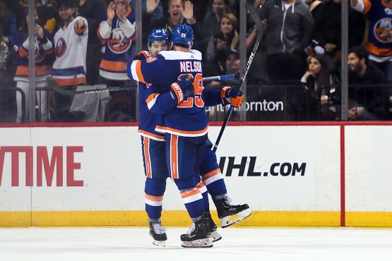 Nov 1, 2018; Brooklyn, NY, USA; New York Islanders left wing Anders Lee (27) celebrates his goal with New York Islanders center Brock Nelson (29) against The Pittsburgh Penguins during the third period at Barclays Center. Mandatory Credit: Dennis Schneidler-USA TODAY Sports