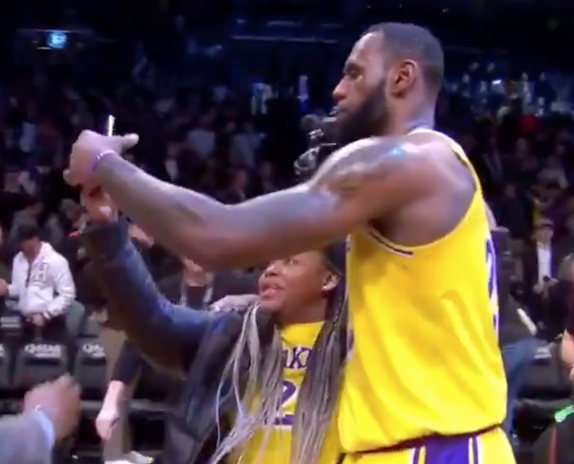 Watch: Fan somehow sneaks onto court, snaps selfie with LeBron James