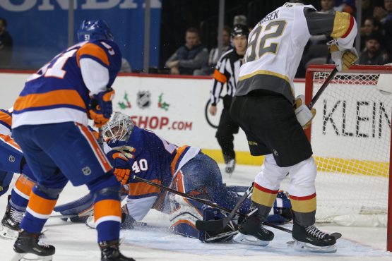 Dec 12, 2018; Brooklyn, NY, USA; Vegas Golden Knights center Tomas Nosek (92) scores the game winning goal past New York Islanders goalie Robin Lehner (40) during the third period at Barclays Center. Mandatory Credit: Brad Penner-USA TODAY Sports