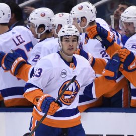 Dec 29, 2018; Toronto, Ontario, CAN; New York Islanders forward Mathew Barzal (13) celebrates a goal against Toronto Maple Leafs in the second period at Scotiabank Arena. Mandatory Credit: Dan Hamilton-USA TODAY Sports