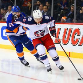 Feb 13, 2018; Brooklyn, NY, USA; Columbus Blue Jackets left wing Artemi Panarin (9) and New York Islanders defenseman Johnny Boychuk (55) pursue a loose puck during the third period at Barclays Center. Mandatory Credit: Andy Marlin-USA TODAY Sports