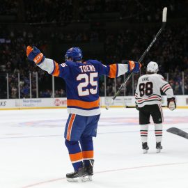 Jan 3, 2019; Uniondale, NY, USA; New York Islanders defenseman Devon Toews (25) celebrates his game winning goal against the Chicago Blackhawks during overtime at Nassau Veterans Memorial Coliseum. Mandatory Credit: Brad Penner-USA TODAY Sports