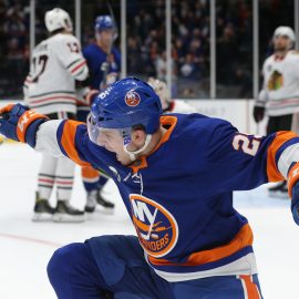 Jan 3, 2019; Uniondale, NY, USA; New York Islanders defenseman Devon Toews (25) celebrates his game winning goal against the Chicago Blackhawks during overtime at Nassau Veterans Memorial Coliseum. Mandatory Credit: Brad Penner-USA TODAY Sports