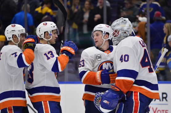 Jan 5, 2019; St. Louis, MO, USA; New York Islanders goaltender Robin Lehner (40) celebrates with center Casey Cizikas (53) and center Mathew Barzal (13) and right wing Jordan Eberle (7) after the Islanders defeated the St. Louis Blues at Enterprise Center. Mandatory Credit: Jeff Curry-USA TODAY Sports