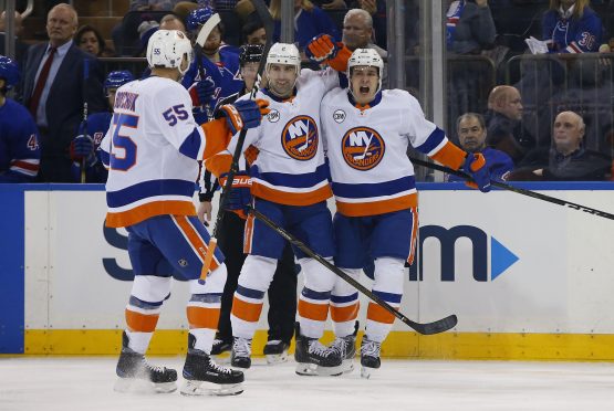 Jan 10, 2019; New York, NY, USA; New York Islanders center Mathew Barzal (13) celebrates after scoring a goal against the New York Rangers during the first period at Madison Square Garden. Mandatory Credit: Noah K. Murray-USA TODAY Sports