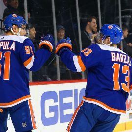 Jan 15, 2019; Brooklyn, NY, USA; New York Islanders center Valtteri Filppula (51) is congratulated by center Mathew Barzal (13) after scoring the game winning goal against the St. Louis Blues during overtime at Barclays Center. Mandatory Credit: Andy Marlin-USA TODAY Sports