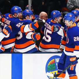 Jan 17, 2019; Uniondale, NY, USA; New York Islanders left wing Michael Dal Colle (28) celebrates with teammates on the bench after scoring a goal against the New Jersey Devils during the first period at Nassau Veterans Memorial Coliseum. Mandatory Credit: Andy Marlin-USA TODAY Sports