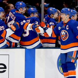 Jan 17, 2019; Uniondale, NY, USA; New York Islanders left wing Anders Lee (27) celebrates with teammates on the bench after scoring a goal against the New Jersey Devils during the first period at Nassau Veterans Memorial Coliseum. Mandatory Credit: Andy Marlin-USA TODAY Sports